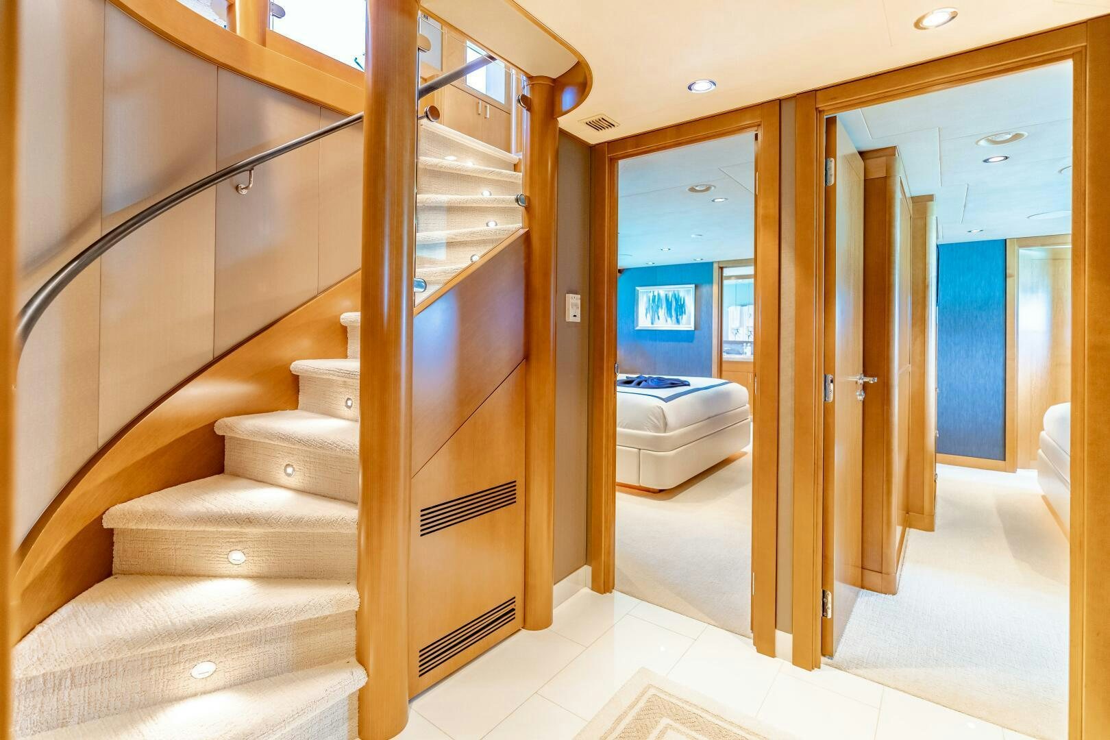 a room with a bed and a staircase aboard FAR NIENTE Yacht for Sale