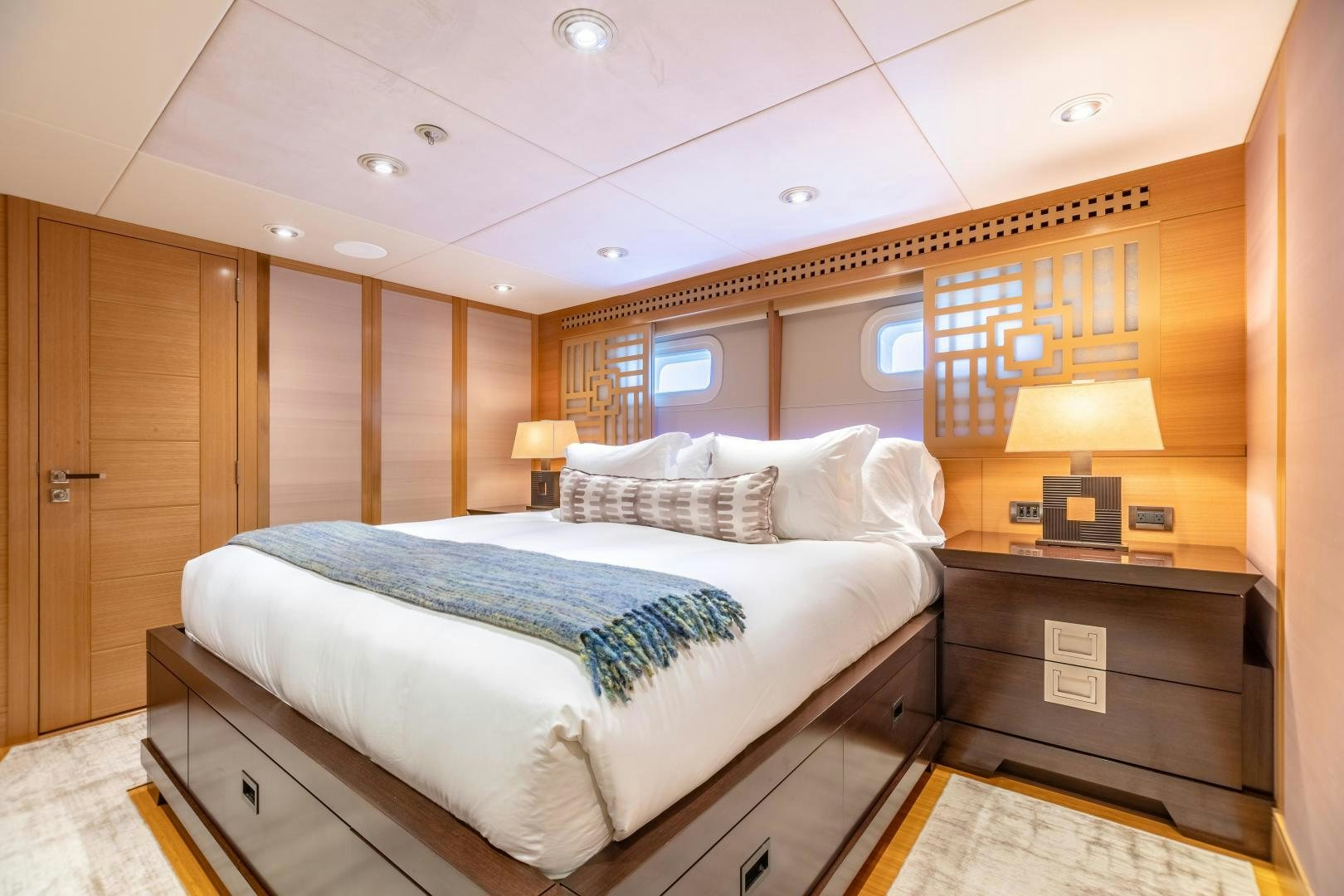 a large bed in a room aboard ROCHADE Yacht for Sale