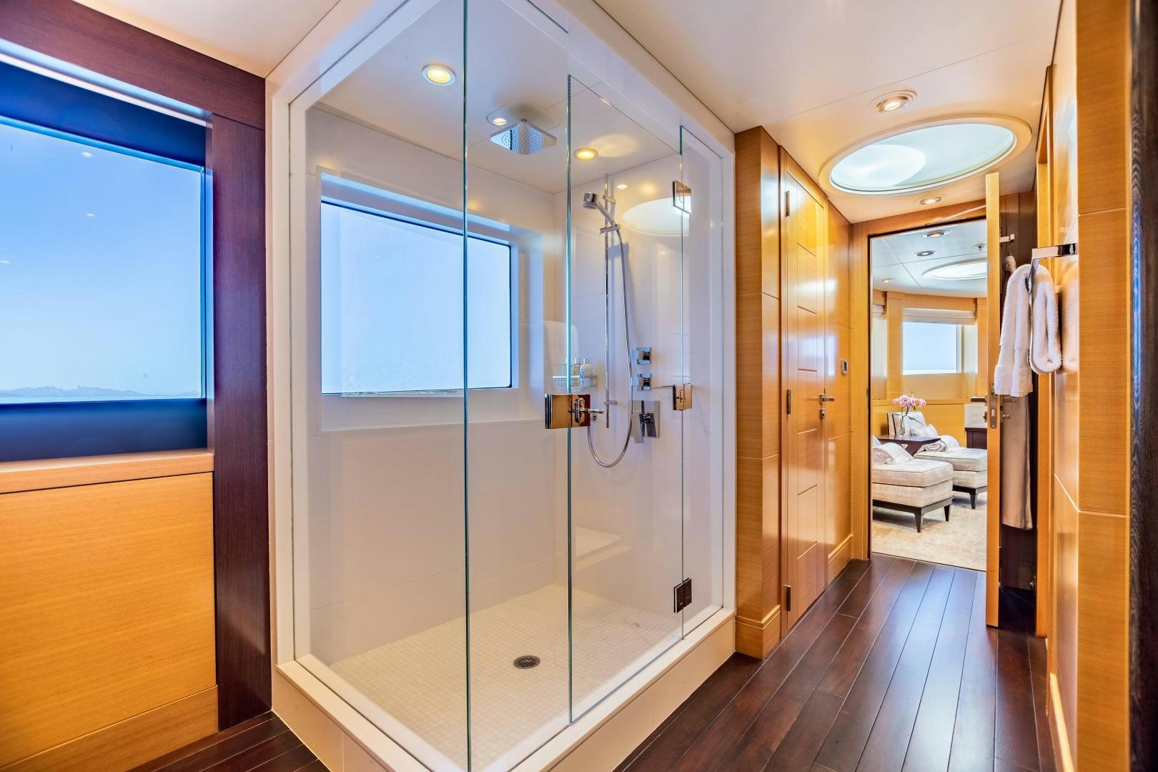 a bathroom with a glass shower aboard ROCHADE Yacht for Sale