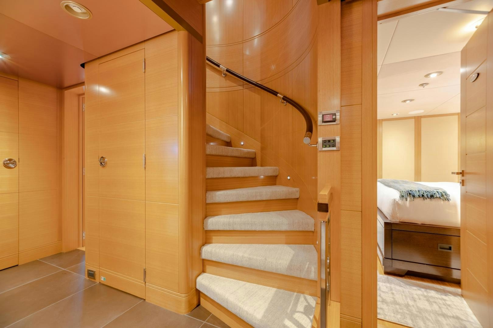 a room with a bed and a closet aboard ROCHADE Yacht for Sale