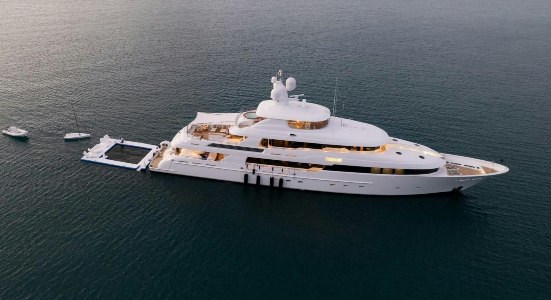 a white yacht in the ocean aboard ROCHADE Yacht for Sale