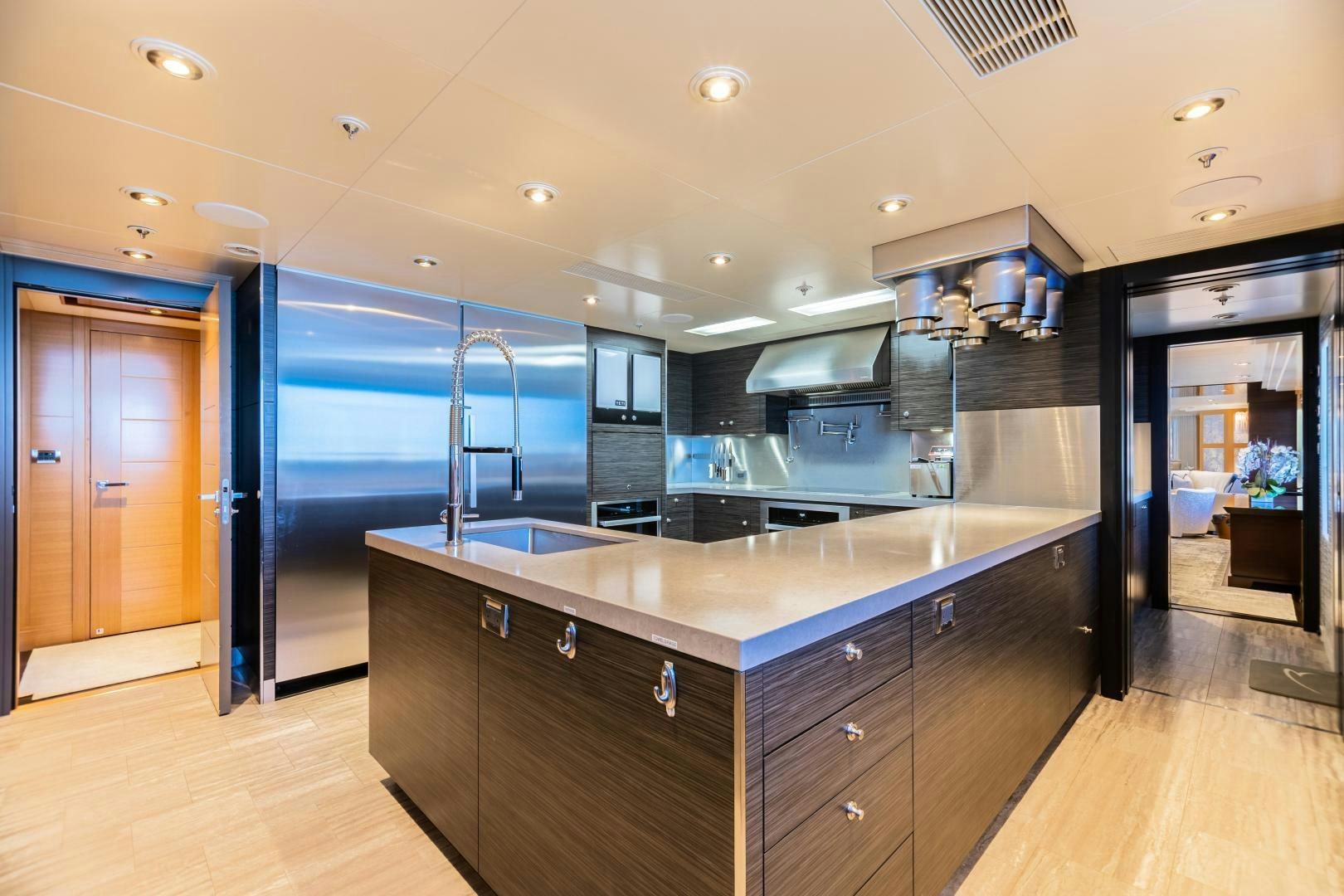 a kitchen with a large island aboard ROCHADE Yacht for Sale