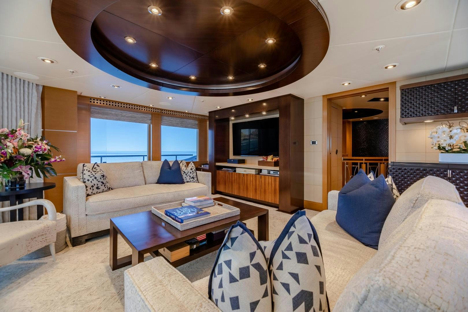 a living room with a couch and a table aboard ROCHADE Yacht for Sale