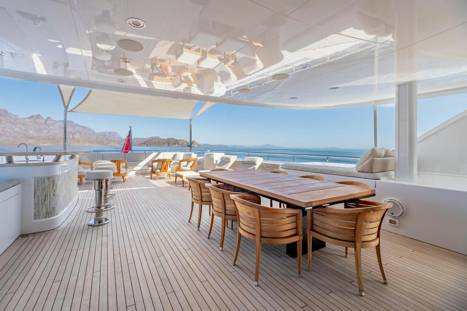 a room with a table and chairs aboard ROCHADE Yacht for Sale