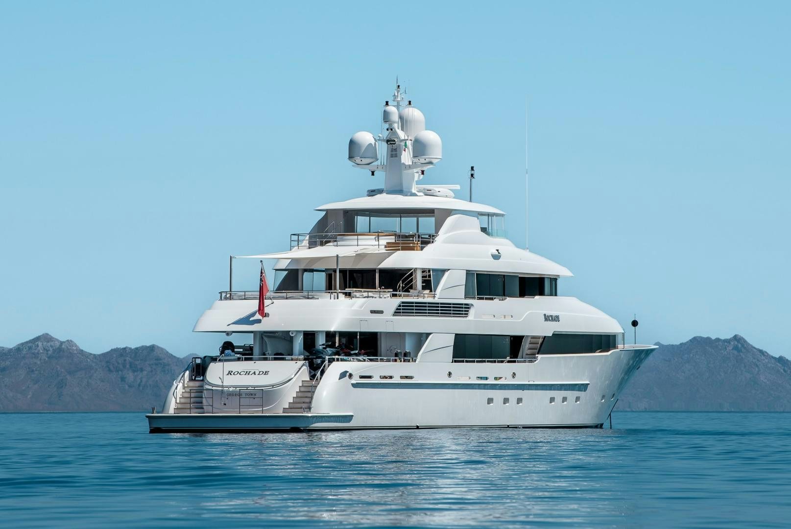 a white yacht in the water aboard ROCHADE Yacht for Sale