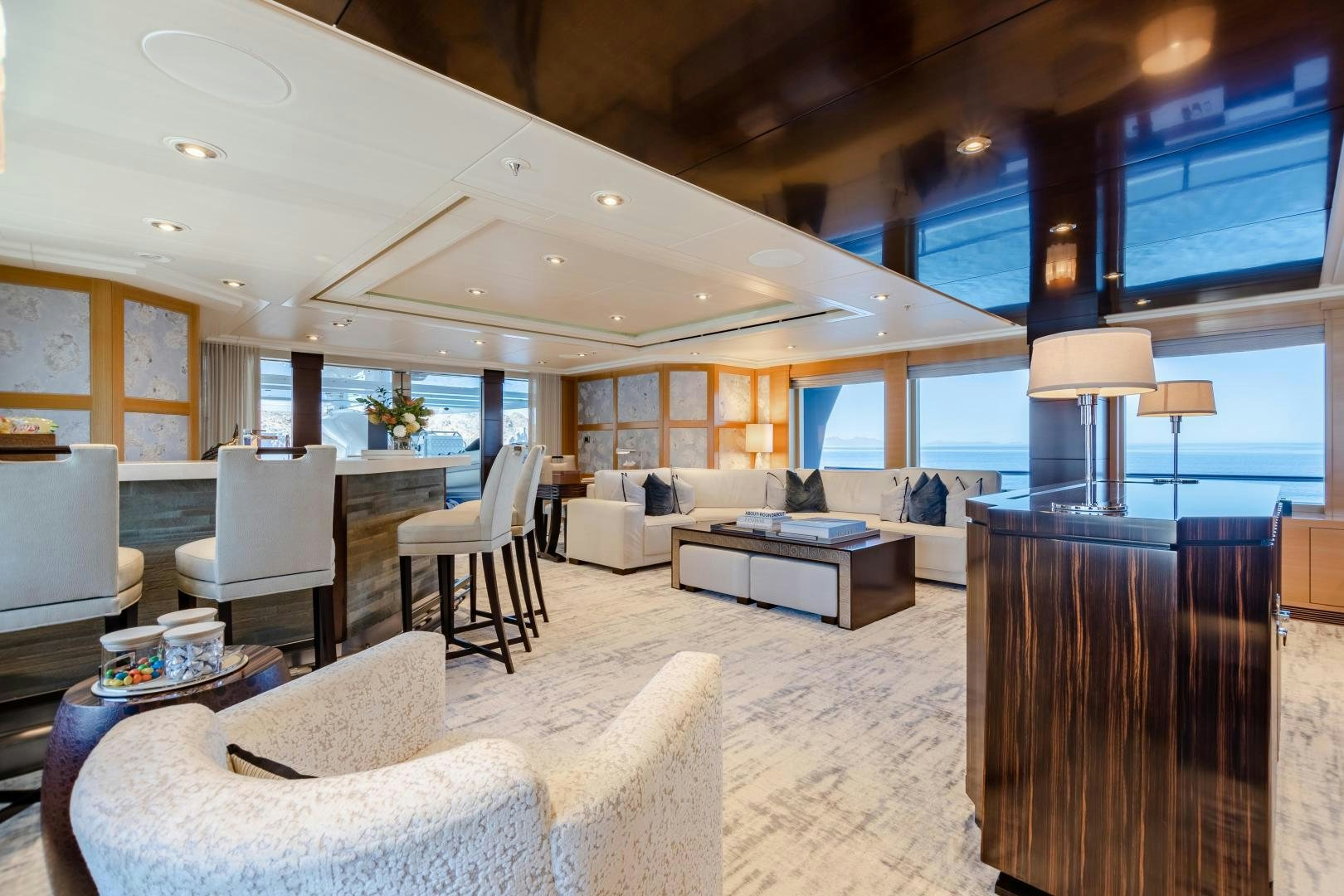 a large living room with a large window aboard ROCHADE Yacht for Sale