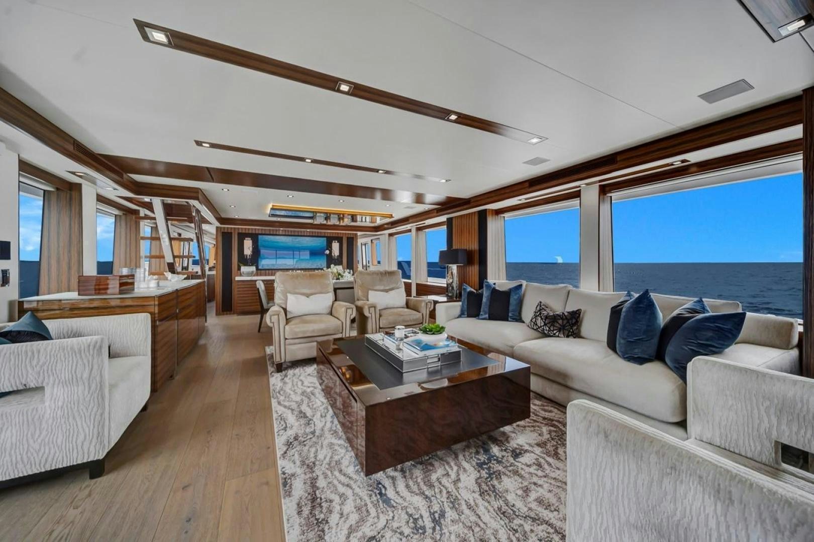 a living room with a large window aboard ON Q Yacht for Sale