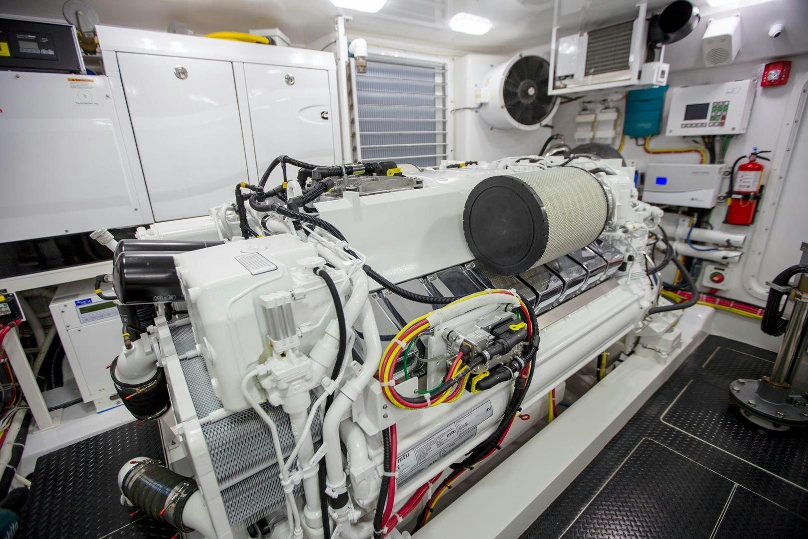 a large white machine with many wires aboard REEL HIGH'S Yacht for Sale