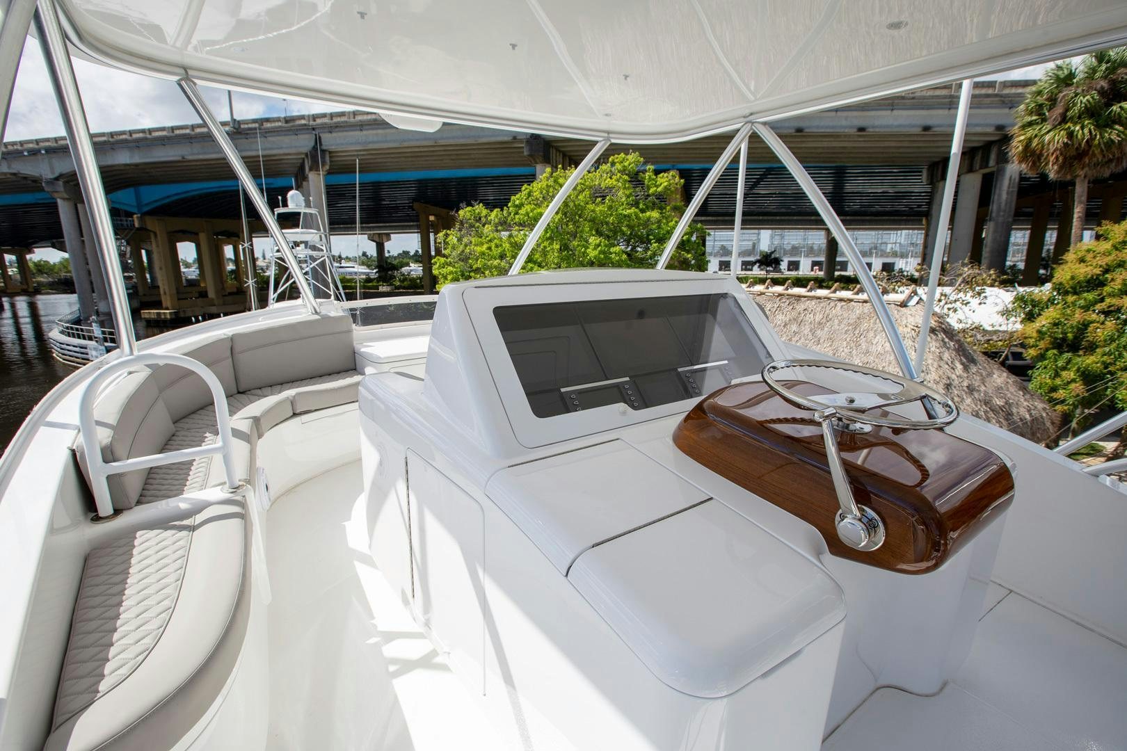 a white car with a red interior aboard REEL HIGH'S Yacht for Sale