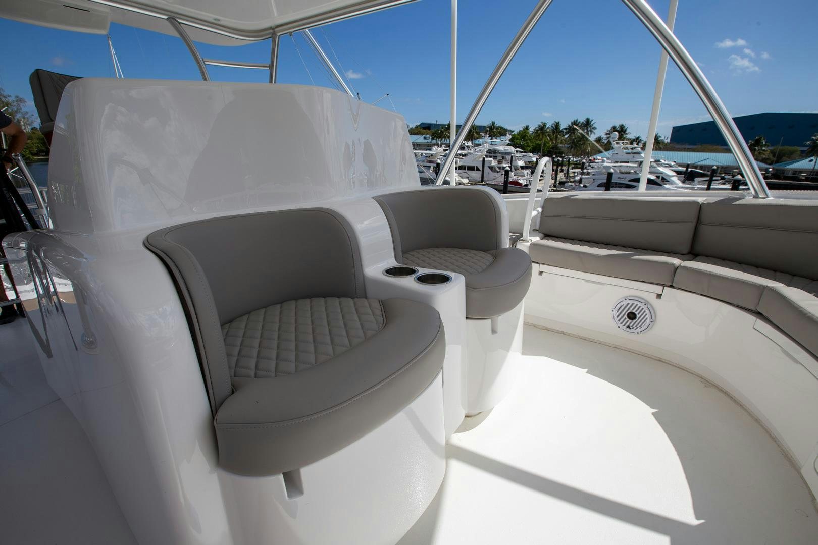 a group of chairs on a boat aboard REEL HIGH'S Yacht for Sale
