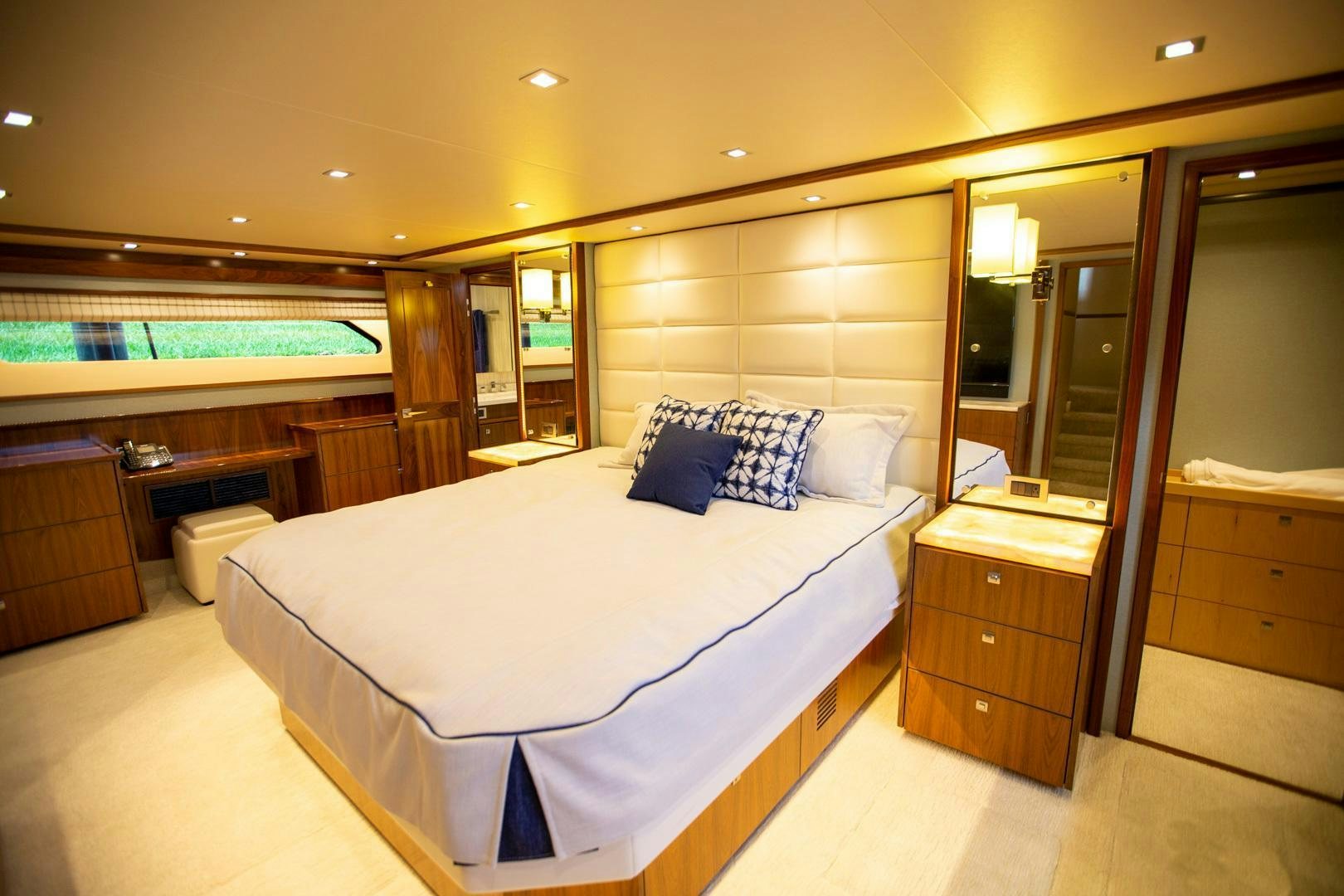a hotel room with a bed aboard REEL HIGH'S Yacht for Sale