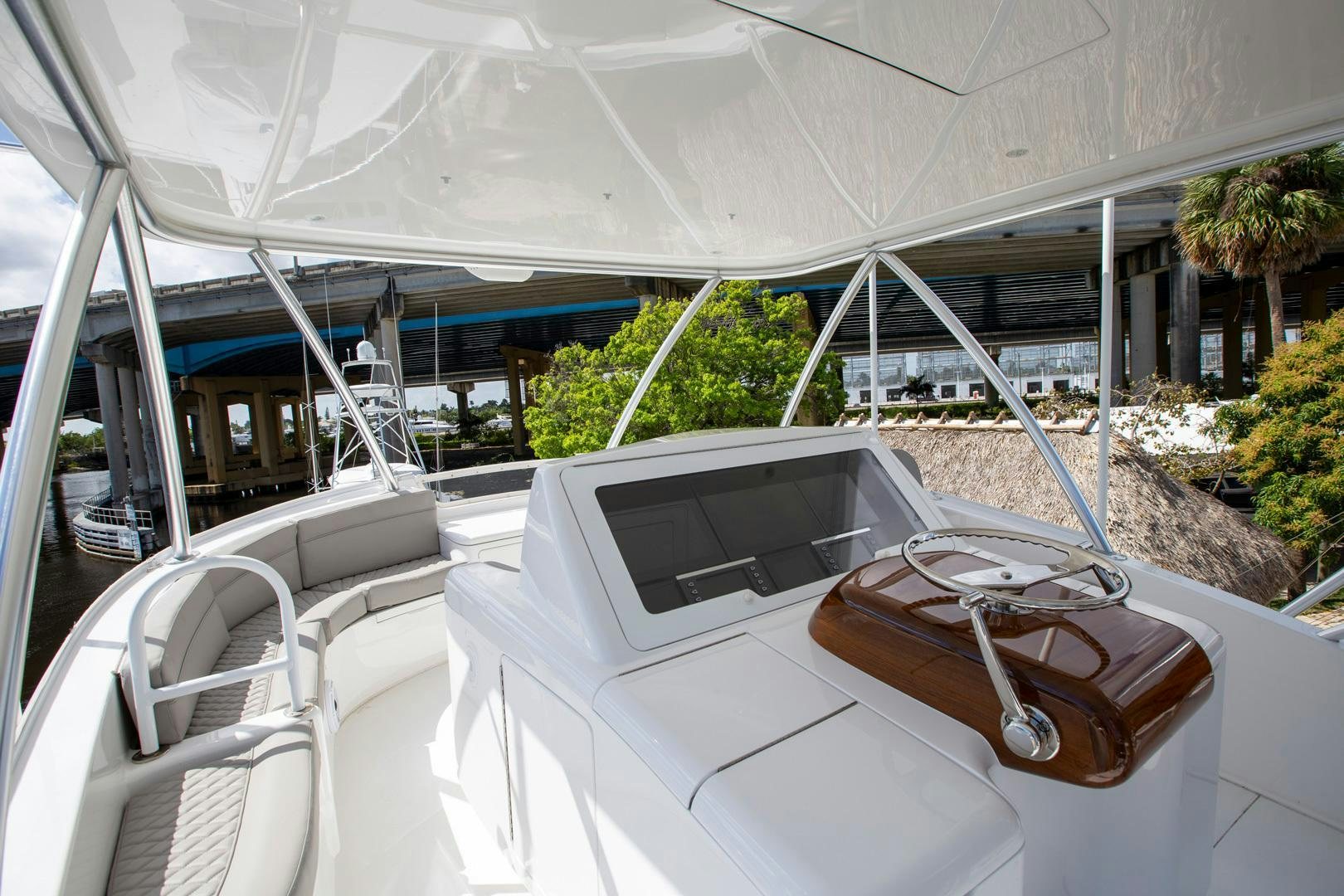 a convertible car on a white surface aboard REEL HIGH'S Yacht for Sale