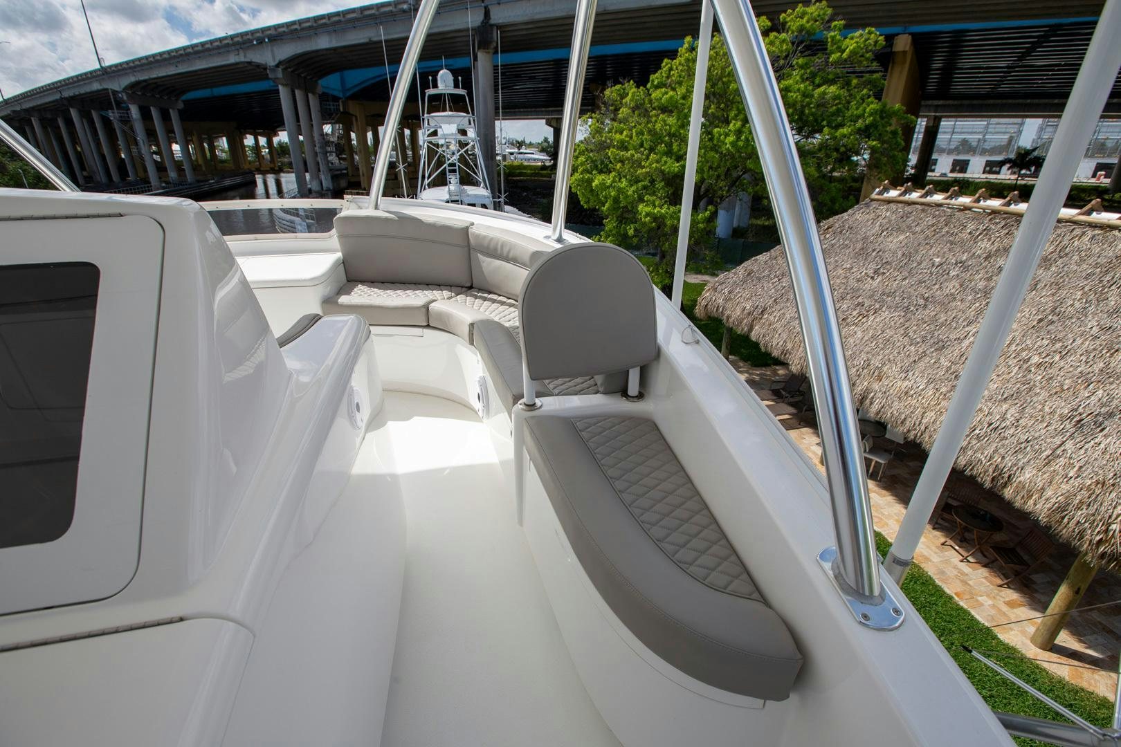 a white chair on a porch aboard REEL HIGH'S Yacht for Sale