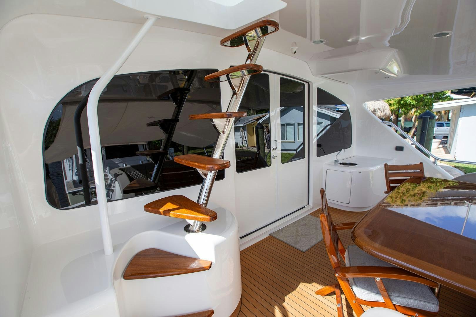 a room with a bunk bed and a table aboard REEL HIGH'S Yacht for Sale