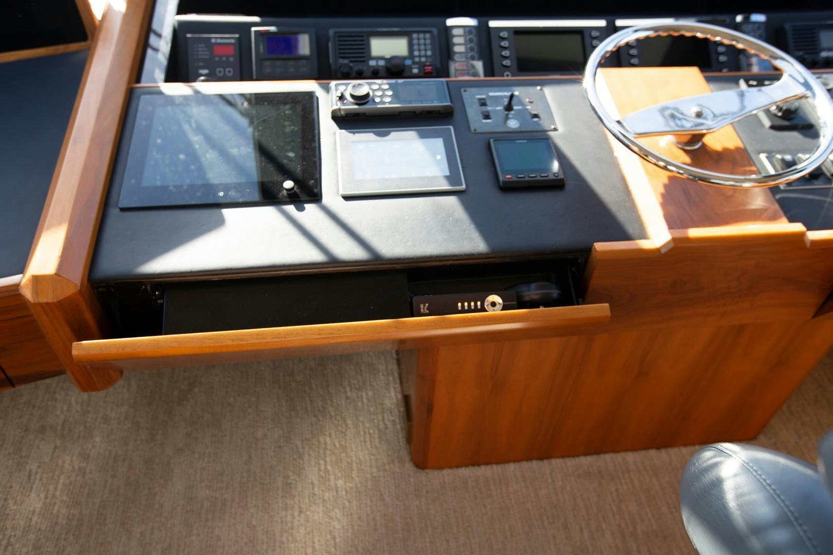 a black electronic device aboard REEL HIGH'S Yacht for Sale