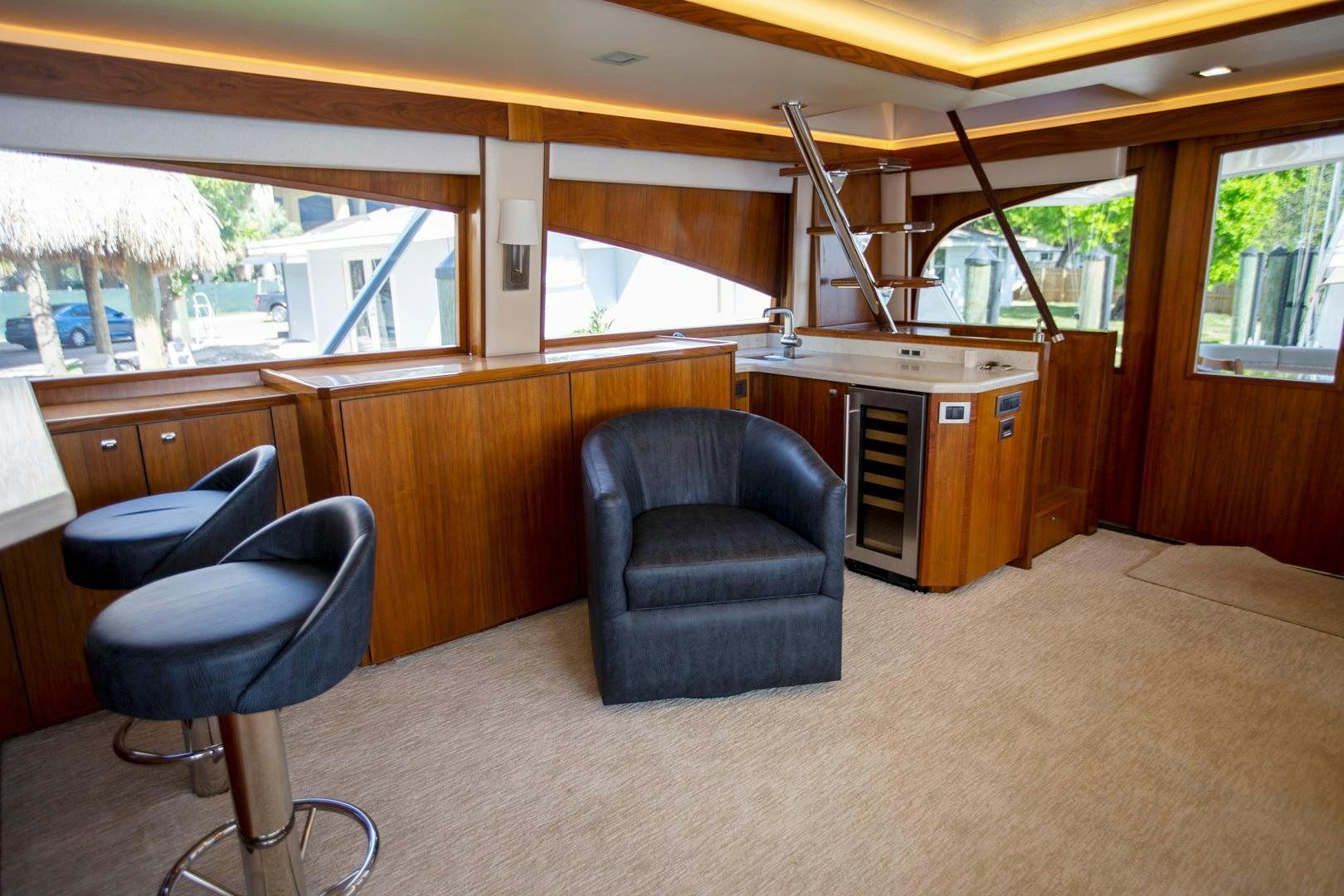 a room with a chair and a desk aboard REEL HIGH'S Yacht for Sale