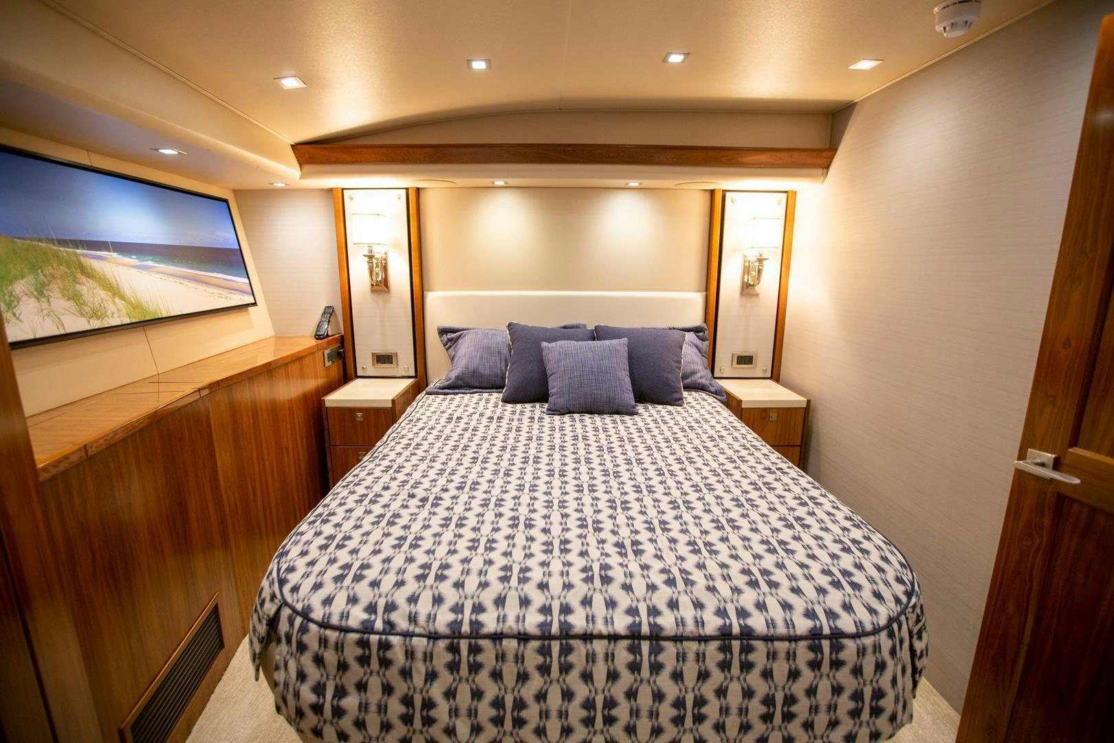 a bed in a room aboard REEL HIGH'S Yacht for Sale