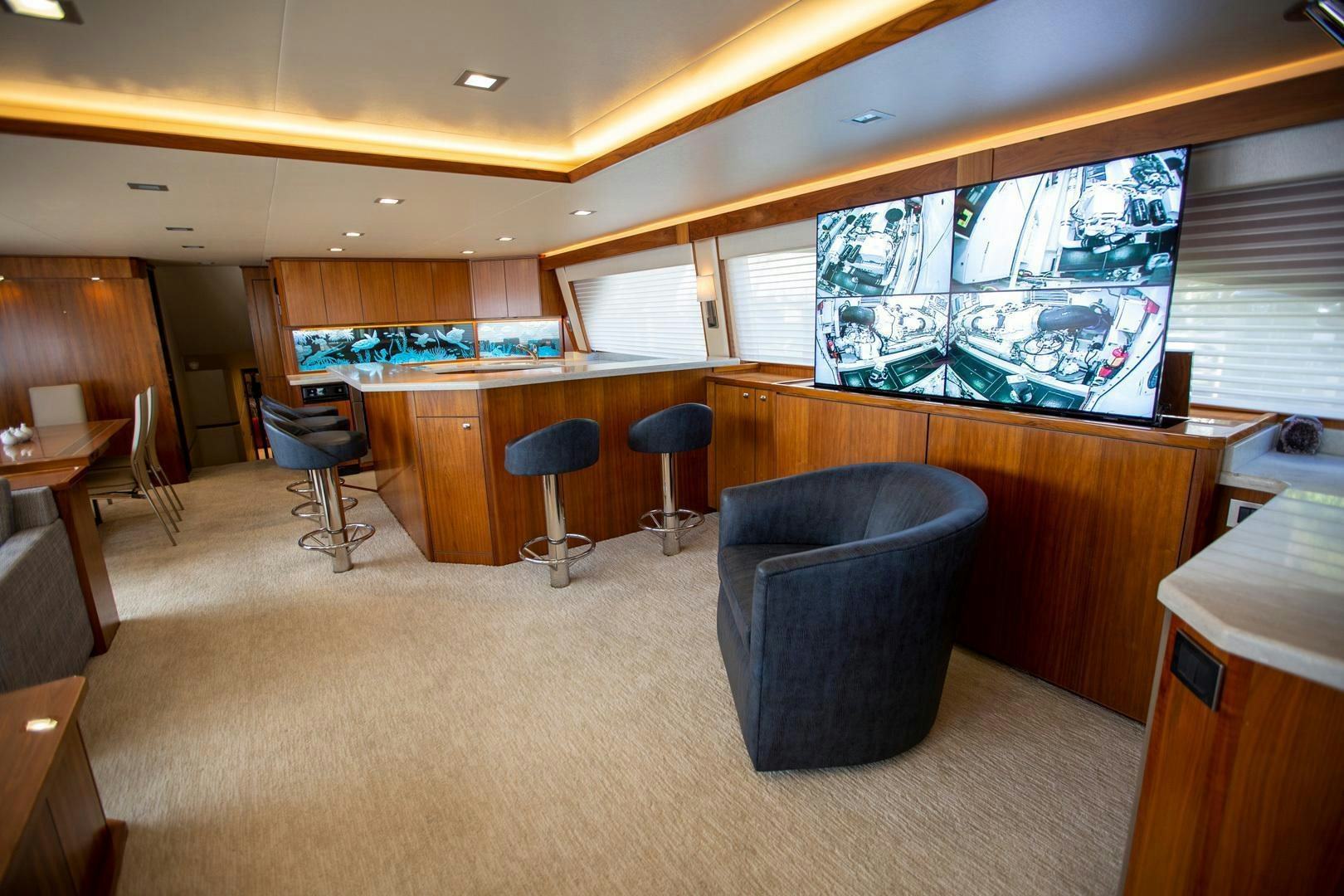 an empty conference room aboard REEL HIGH'S Yacht for Sale