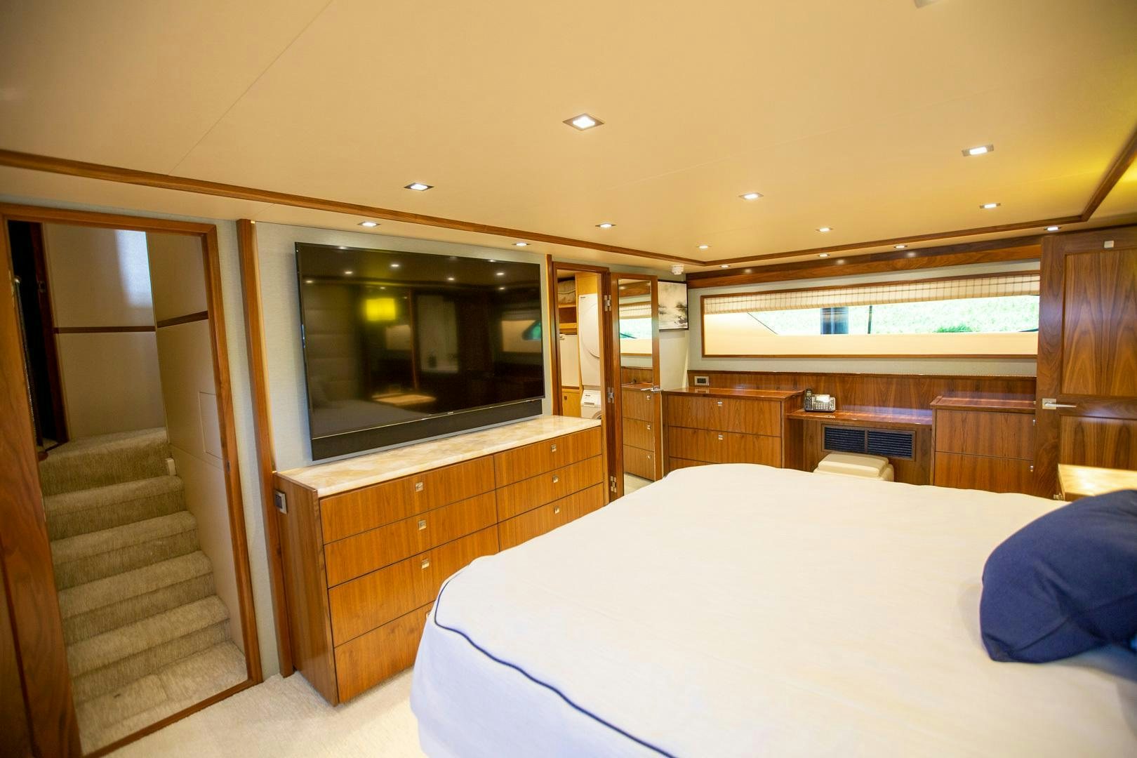 a bed in a room aboard REEL HIGH'S Yacht for Sale