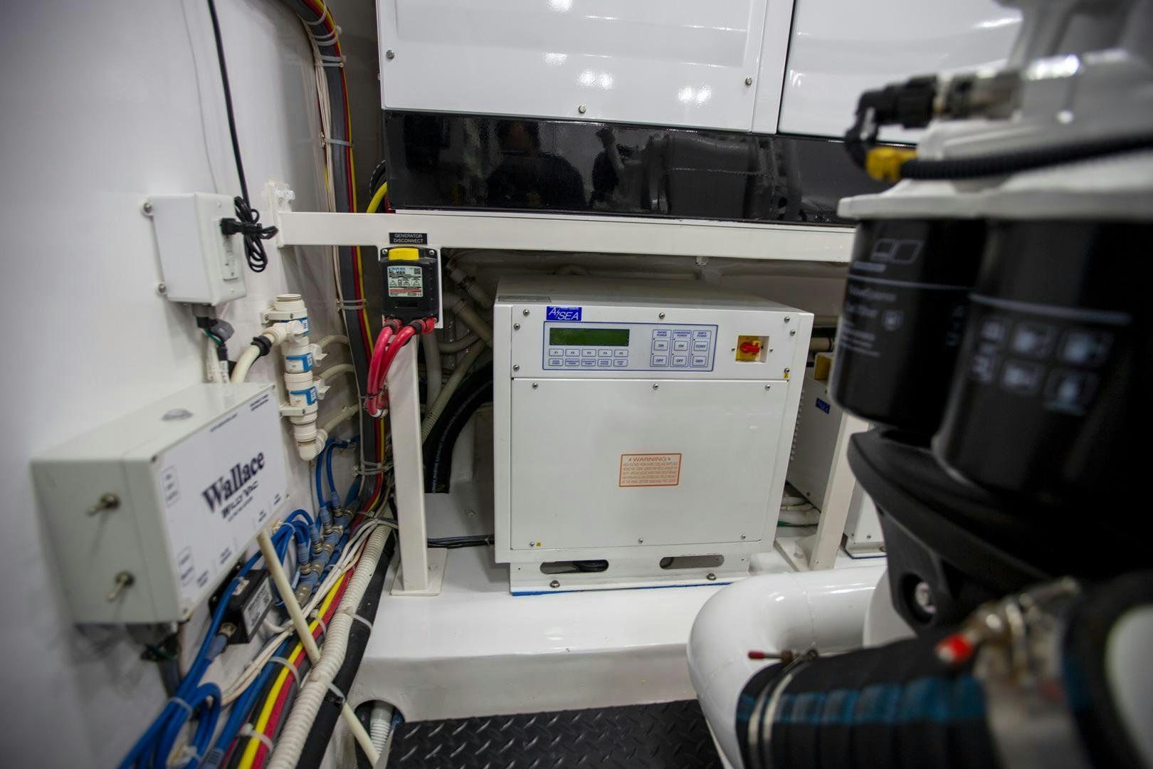 a machine with a piece of equipment aboard REEL HIGH'S Yacht for Sale