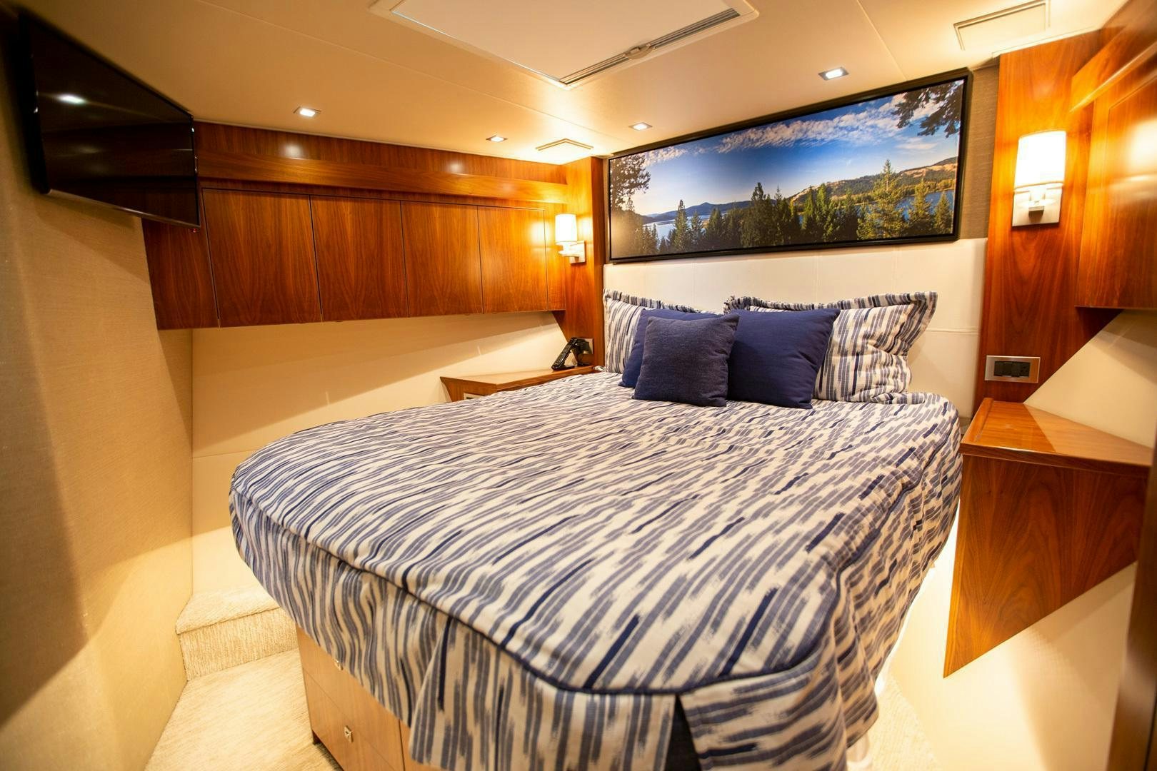 a bed with pillows aboard REEL HIGH'S Yacht for Sale