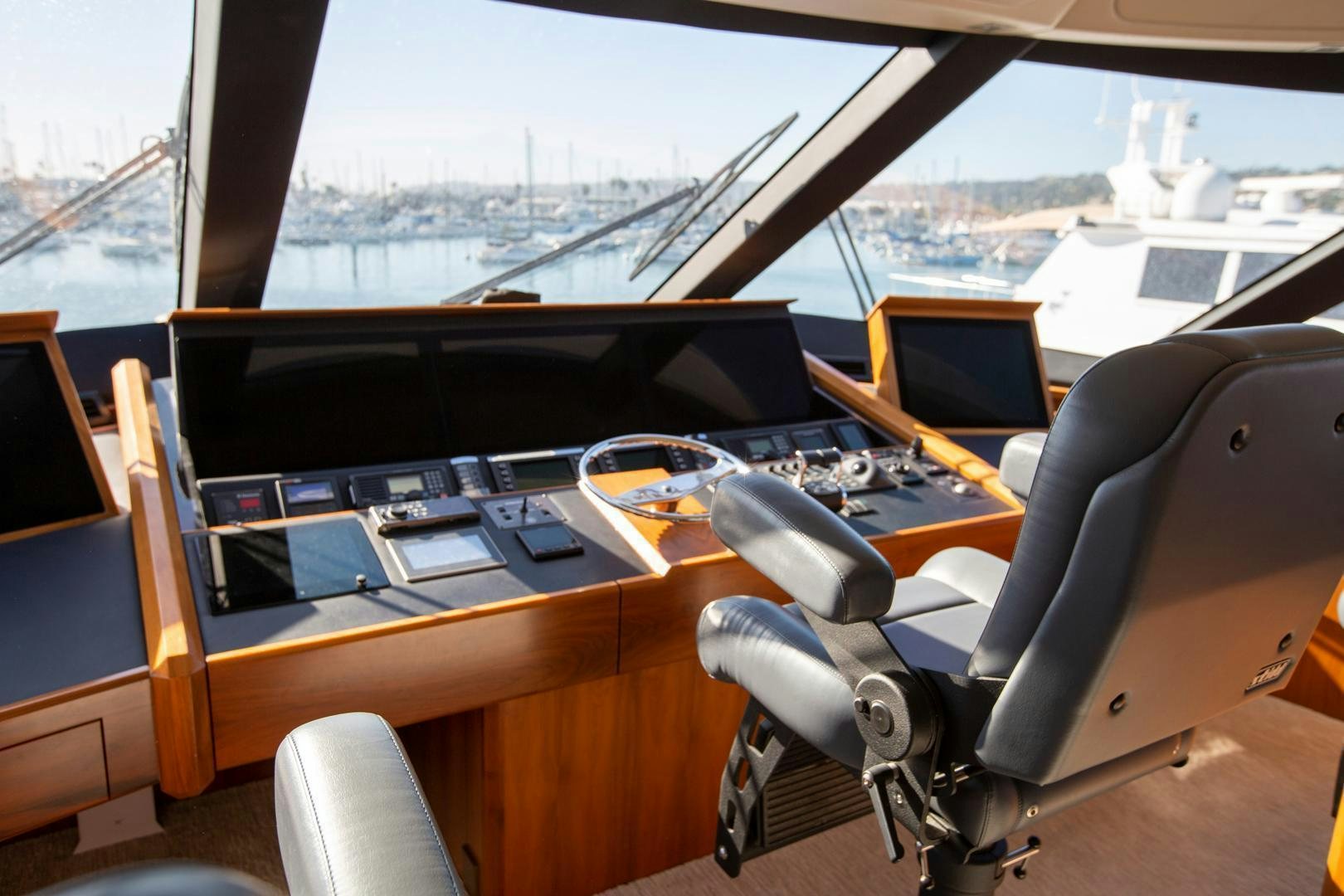 a desk with a computer and a keyboard aboard REEL HIGH'S Yacht for Sale