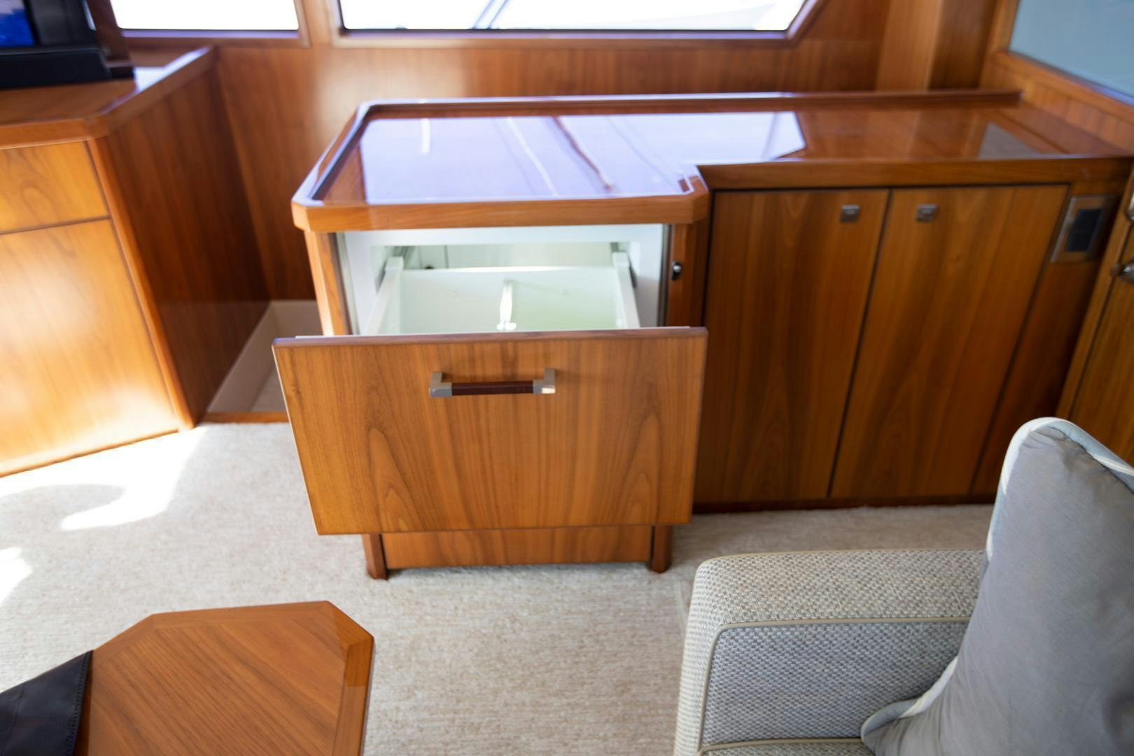 a wooden cabinet with a shelf aboard REEL HIGH'S Yacht for Sale