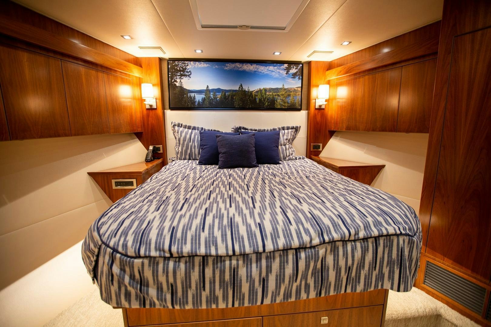 a bed in a room aboard REEL HIGH'S Yacht for Sale