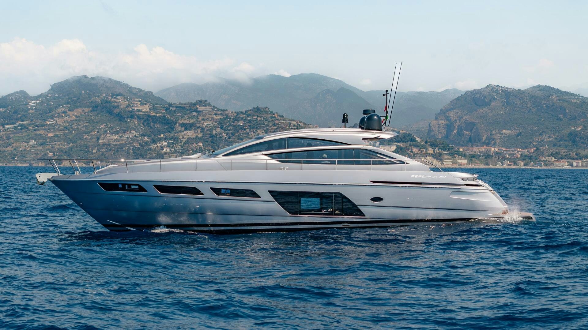 a white yacht in the water aboard SILVER MISSILE Yacht for Sale