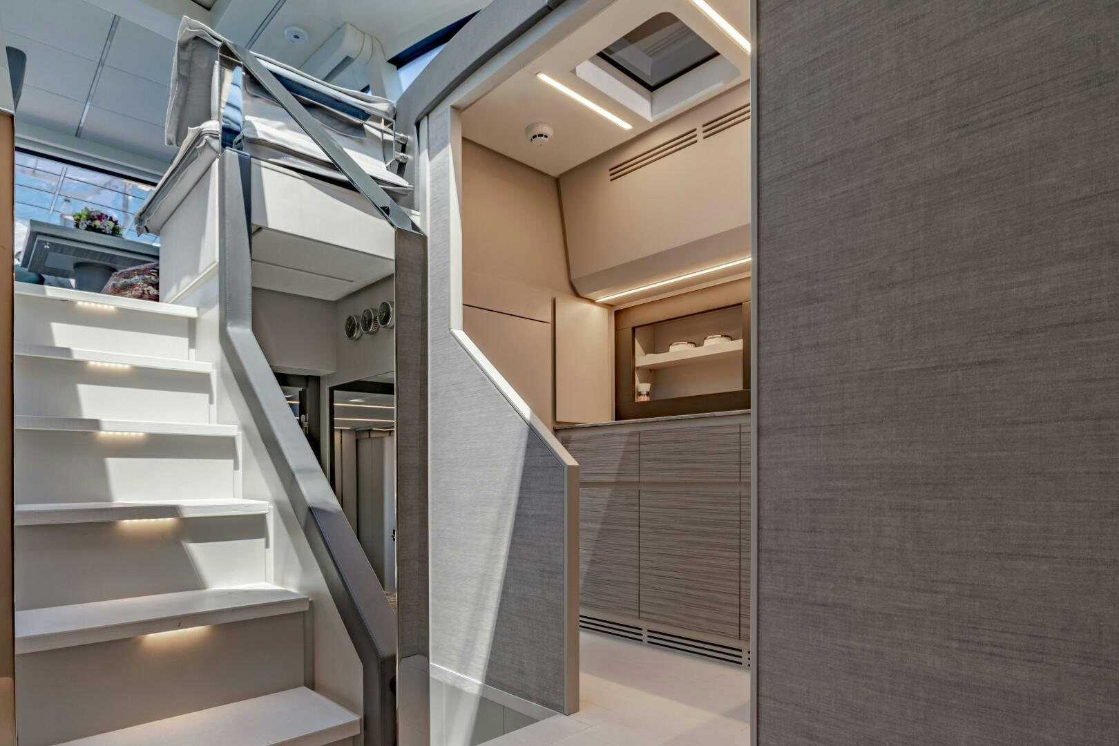 a room with white shelves aboard SILVER MISSILE Yacht for Sale