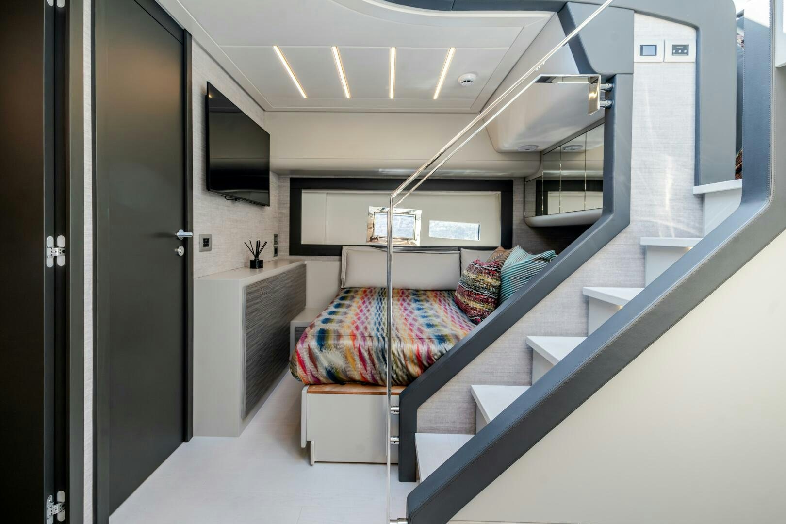 a person lying on a bed aboard SILVER MISSILE Yacht for Sale