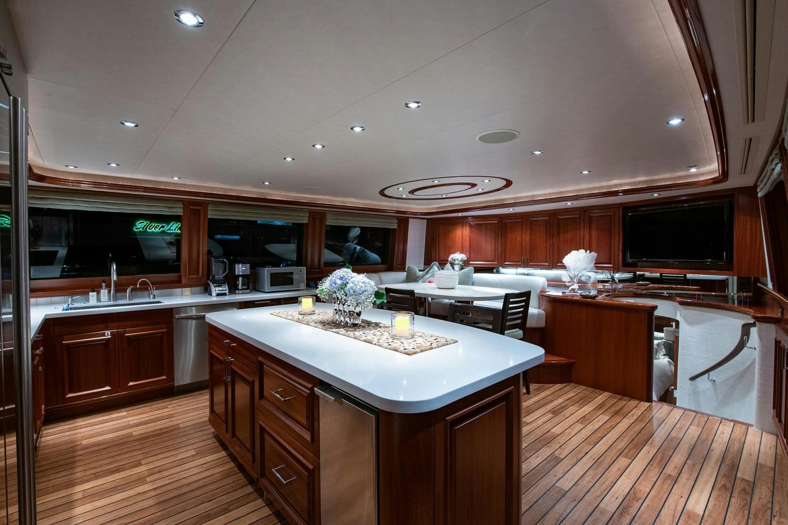 a kitchen with a large island aboard CERCA TROVA Yacht for Sale