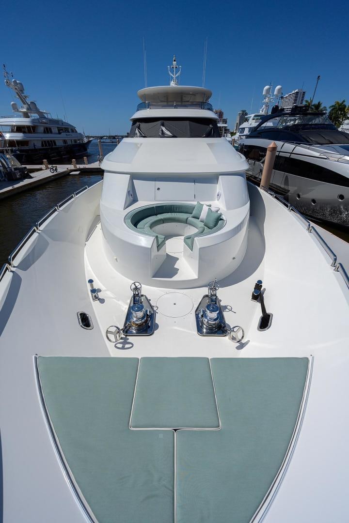 a large white ship with a statue on it aboard CERCA TROVA Yacht for Sale