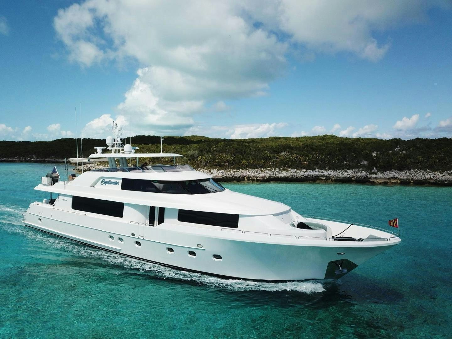 a white yacht in the water aboard CERCA TROVA Yacht for Sale