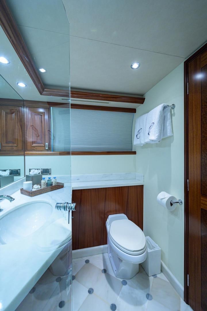 a bathroom with a toilet sink and a bathtub aboard CERCA TROVA Yacht for Sale