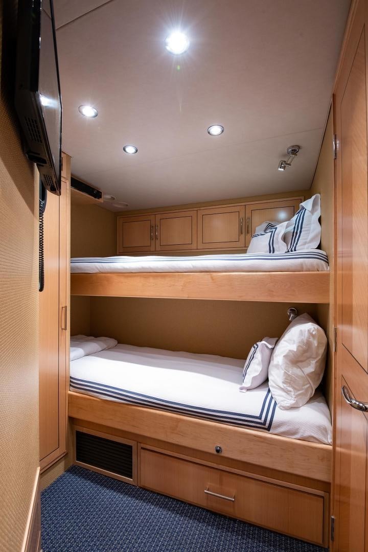 a room with bunk beds aboard CERCA TROVA Yacht for Sale