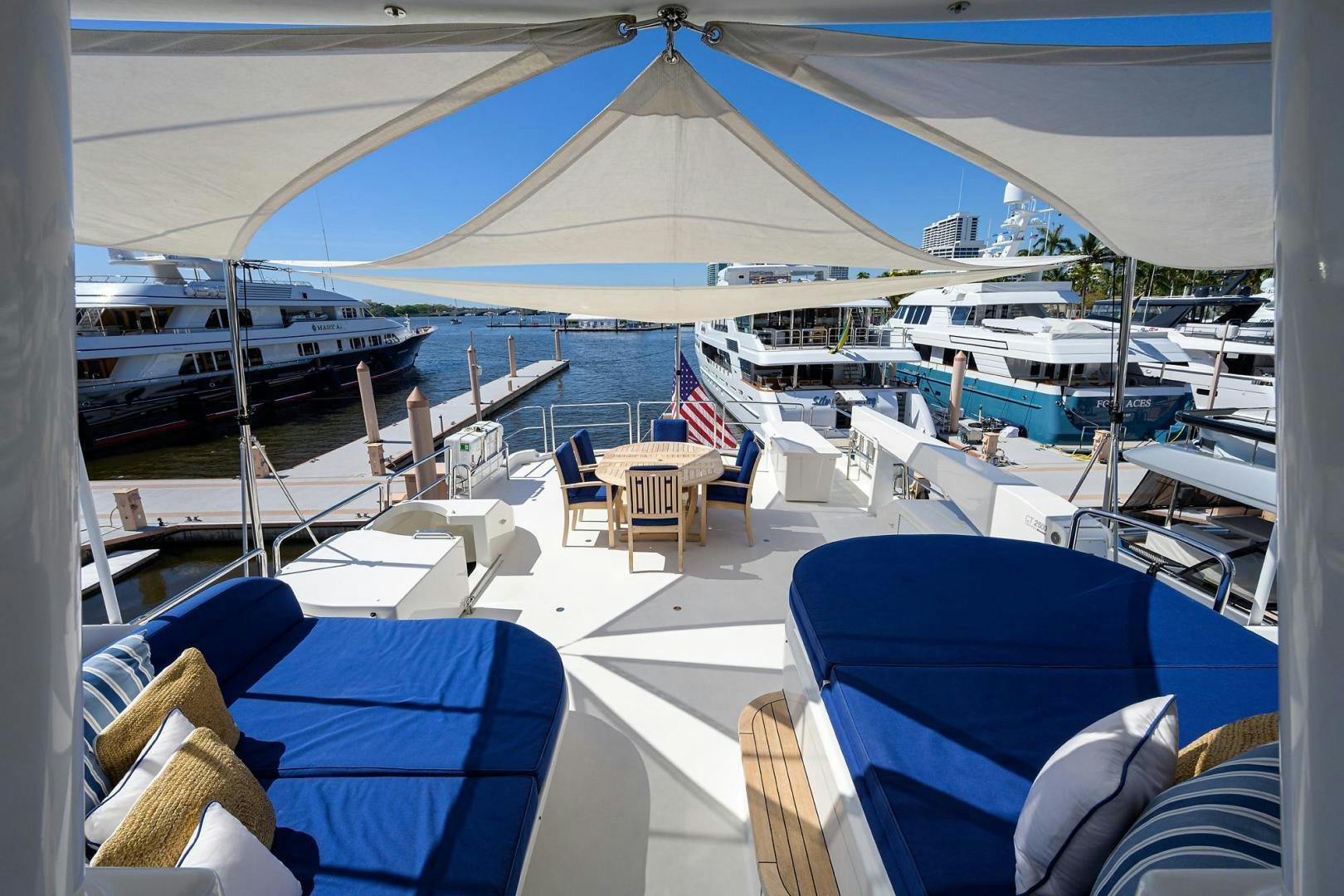 a boat dock with many boats aboard CERCA TROVA Yacht for Sale