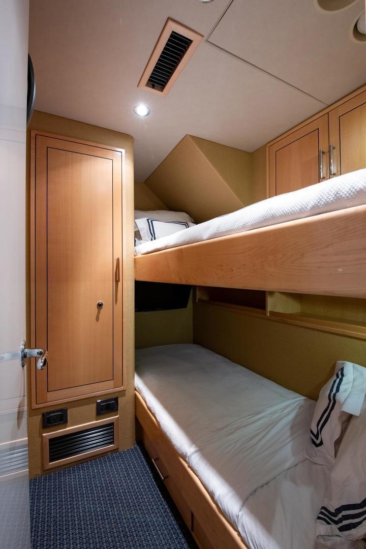 a room with two beds aboard CERCA TROVA Yacht for Sale