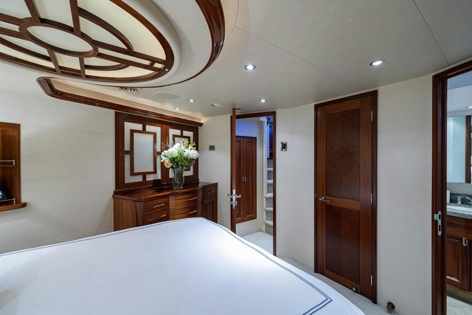 a large bedroom with a large bed aboard CERCA TROVA Yacht for Sale