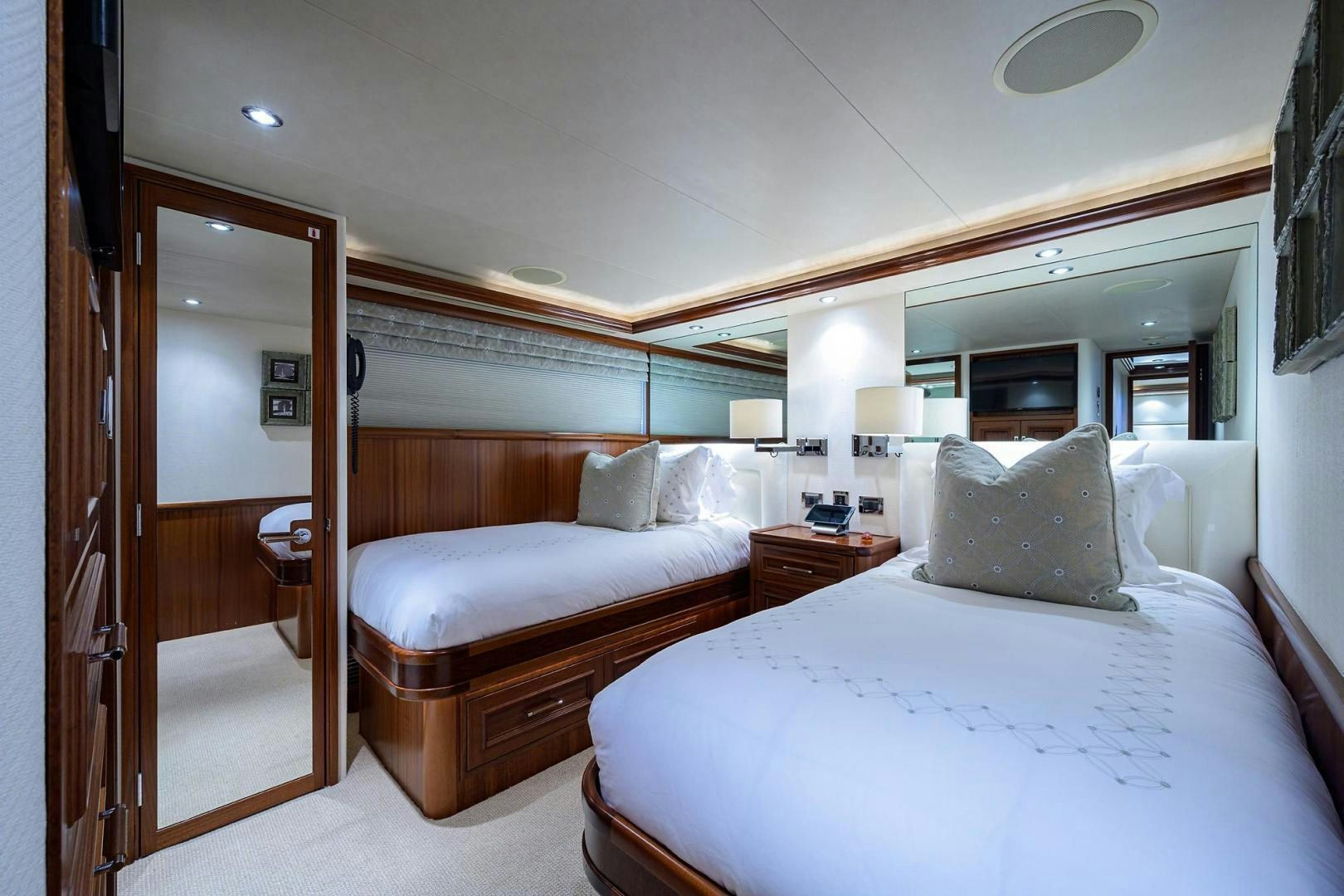 a room with two beds aboard CERCA TROVA Yacht for Sale