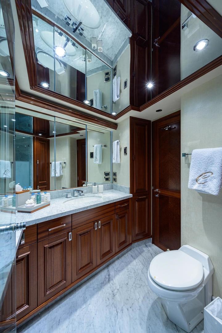 a bathroom with a large mirror aboard CERCA TROVA Yacht for Sale