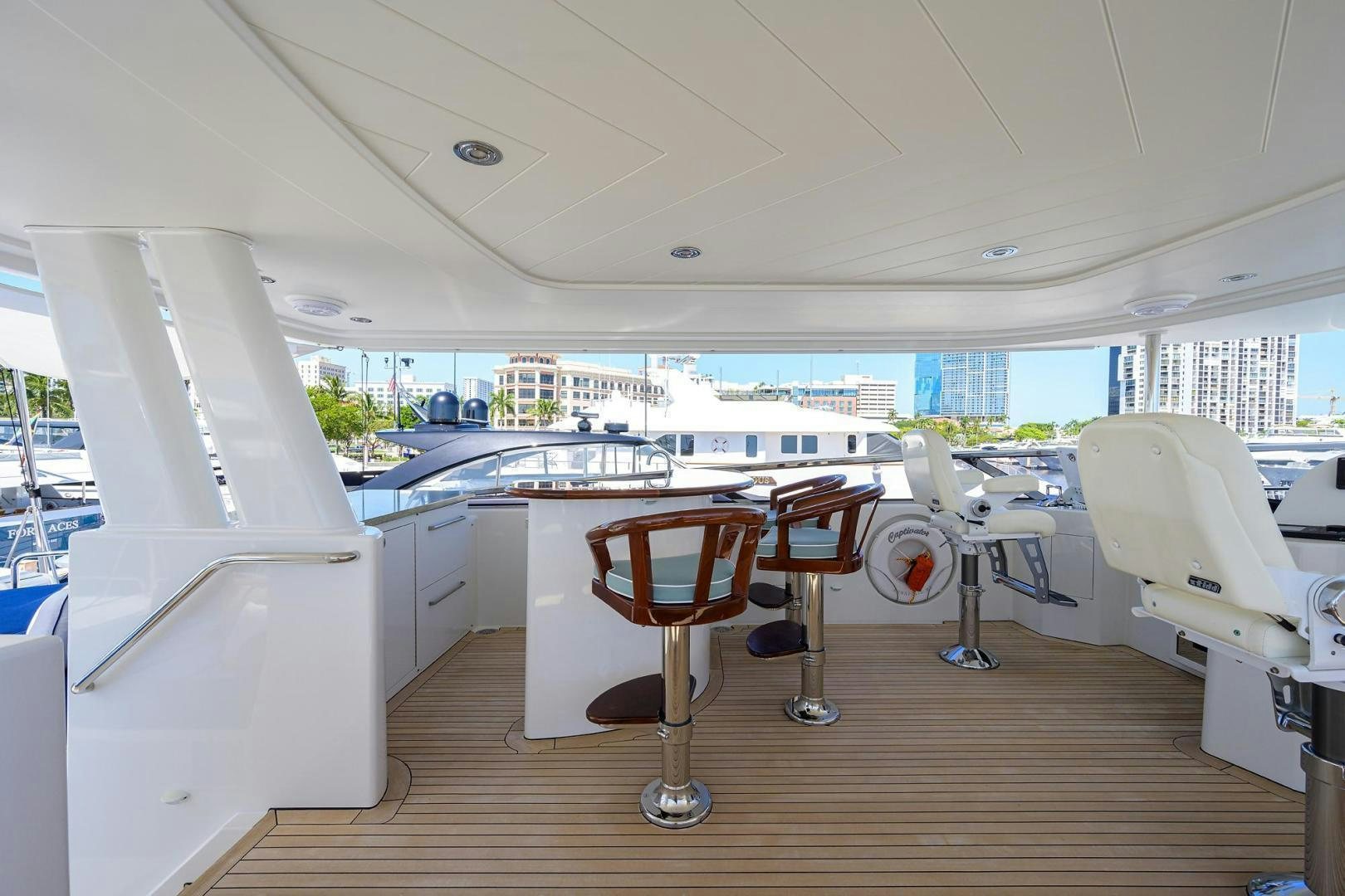 a room with a table and chairs aboard CERCA TROVA Yacht for Sale