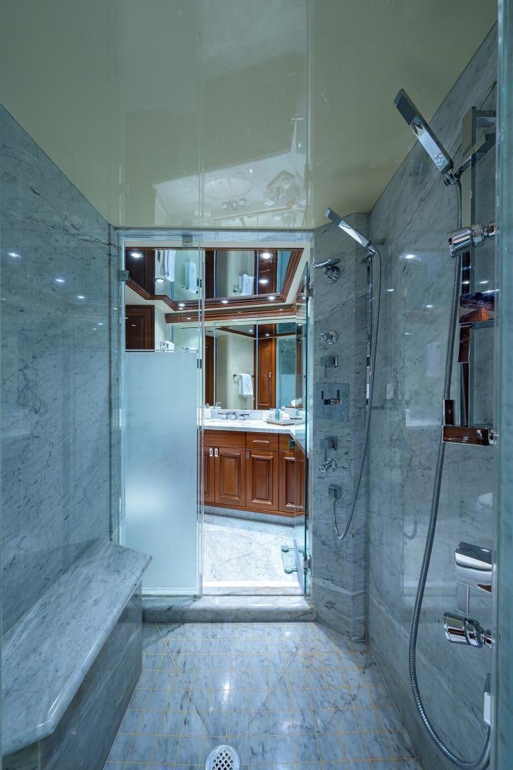 a bathroom with a shower unit aboard CERCA TROVA Yacht for Sale
