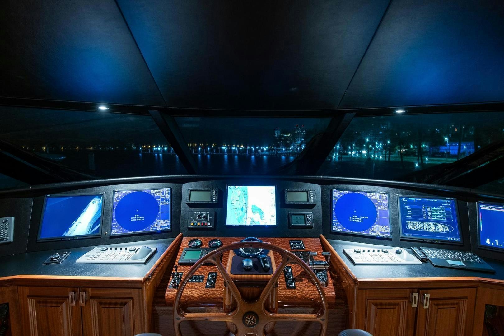 a room with many screens aboard CERCA TROVA Yacht for Sale