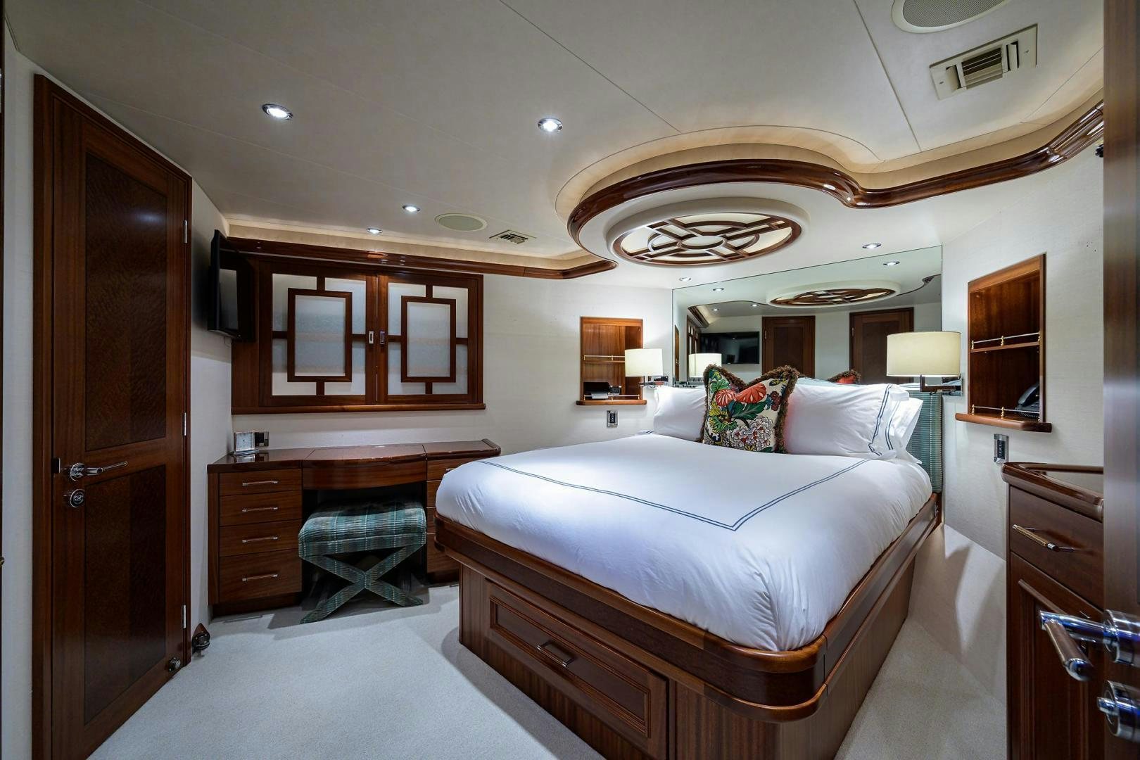 a bedroom with a large bed aboard CERCA TROVA Yacht for Sale