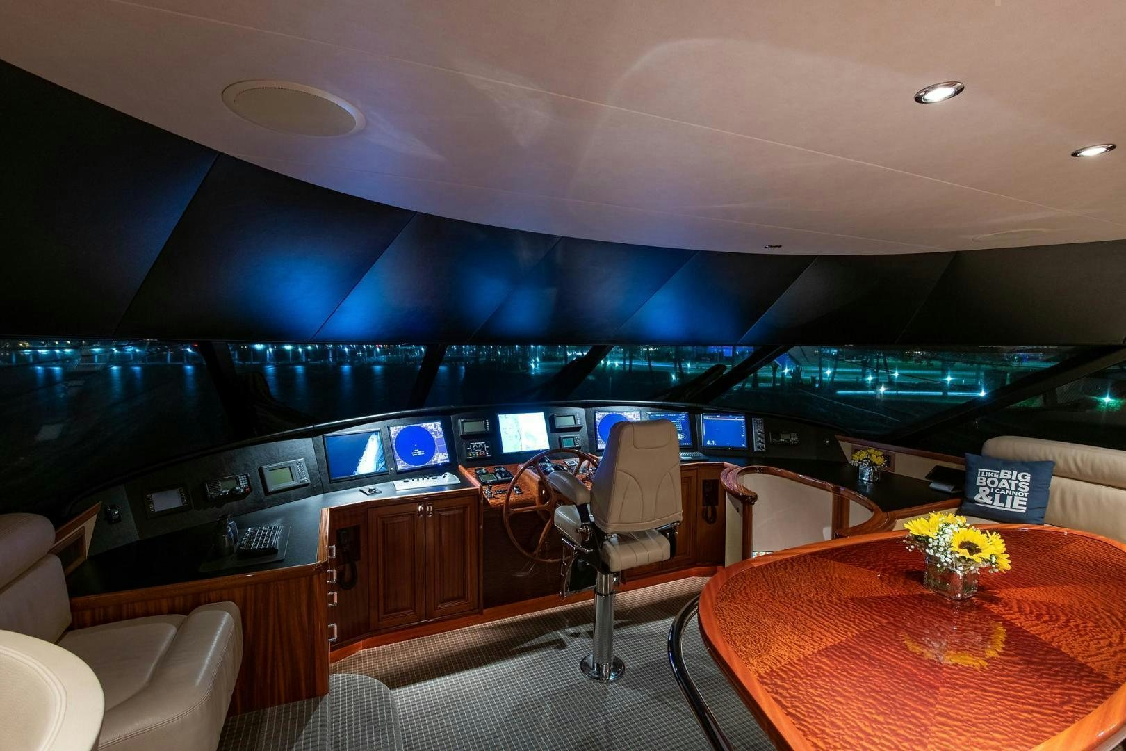 a room with a table and chairs aboard CERCA TROVA Yacht for Sale