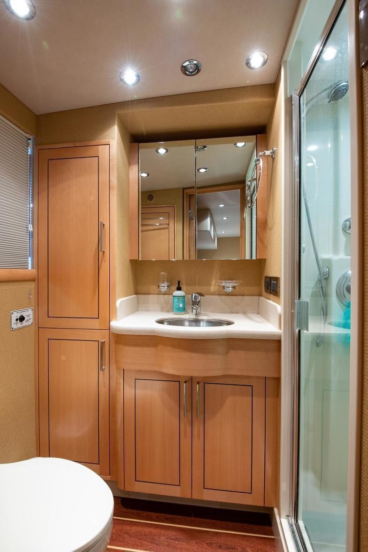 a bathroom with a sink and a toilet aboard CERCA TROVA Yacht for Sale