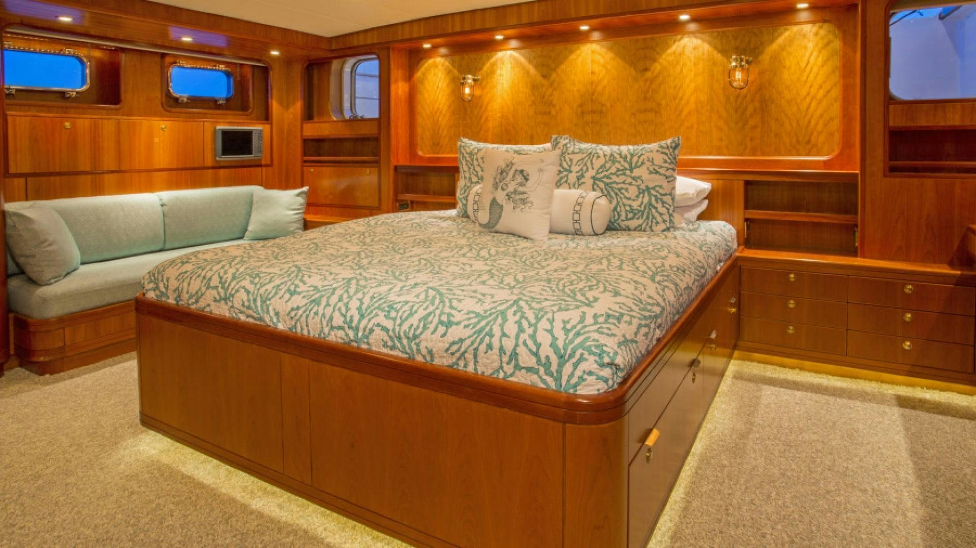 a bed in a room aboard MYU Yacht for Sale