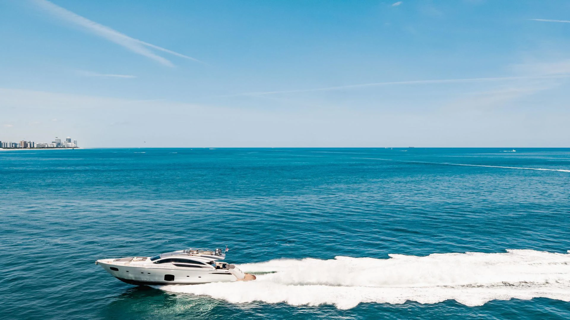 a white boat in the water aboard DOUBLE OR NOTHING Yacht for Sale
