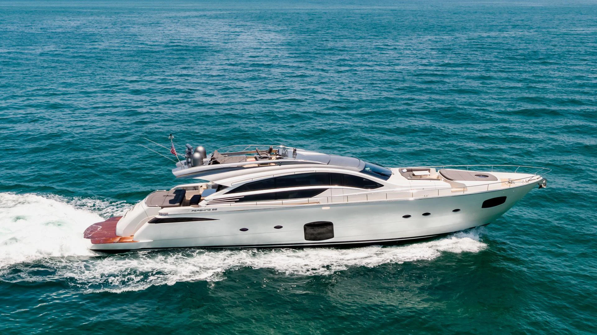 a white yacht in the ocean aboard DOUBLE OR NOTHING Yacht for Sale